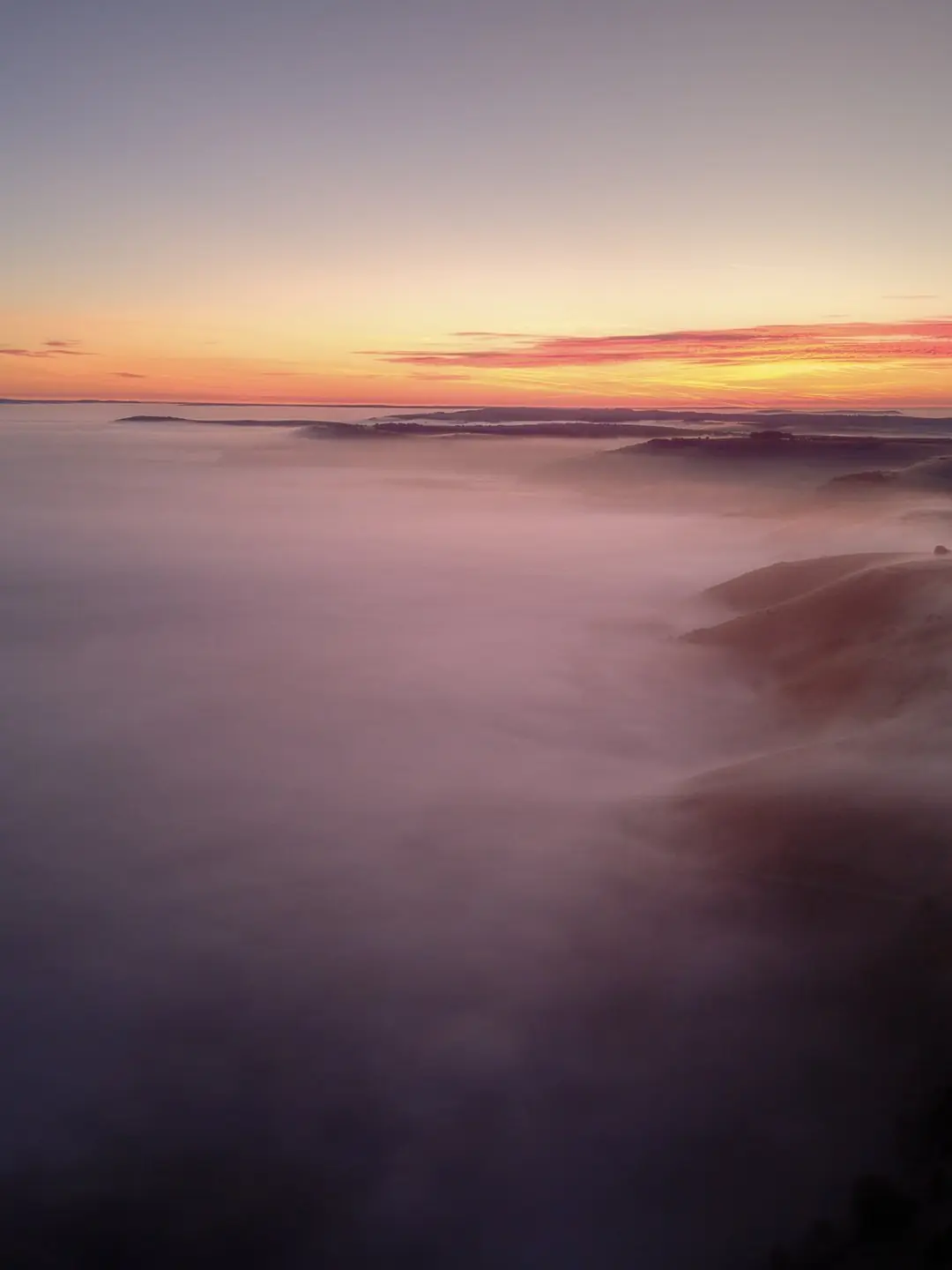 Early morning light over the Downs from the top of Truleigh Hill
